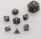 Noppasetti: Hymgho - Dragons Eye Dice Set Gunmetal W/Purple Gems 10mm (7)